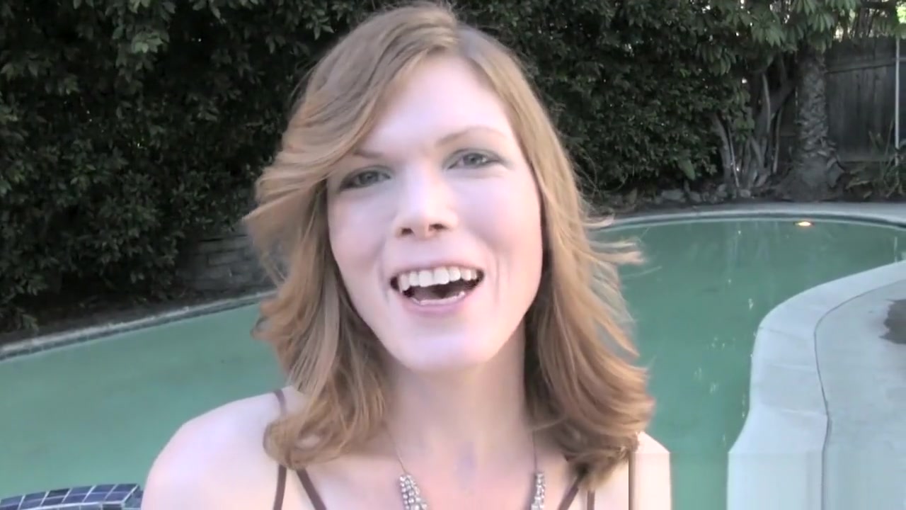 Classy tranny teasing her asshole outdoors