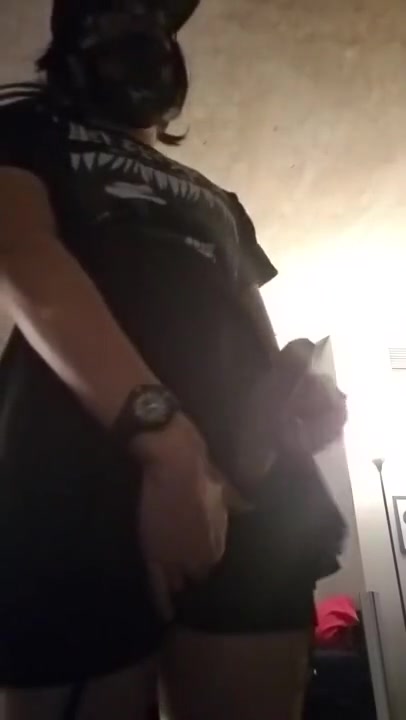 Crossdressing tall femme boy strokes cock and cums