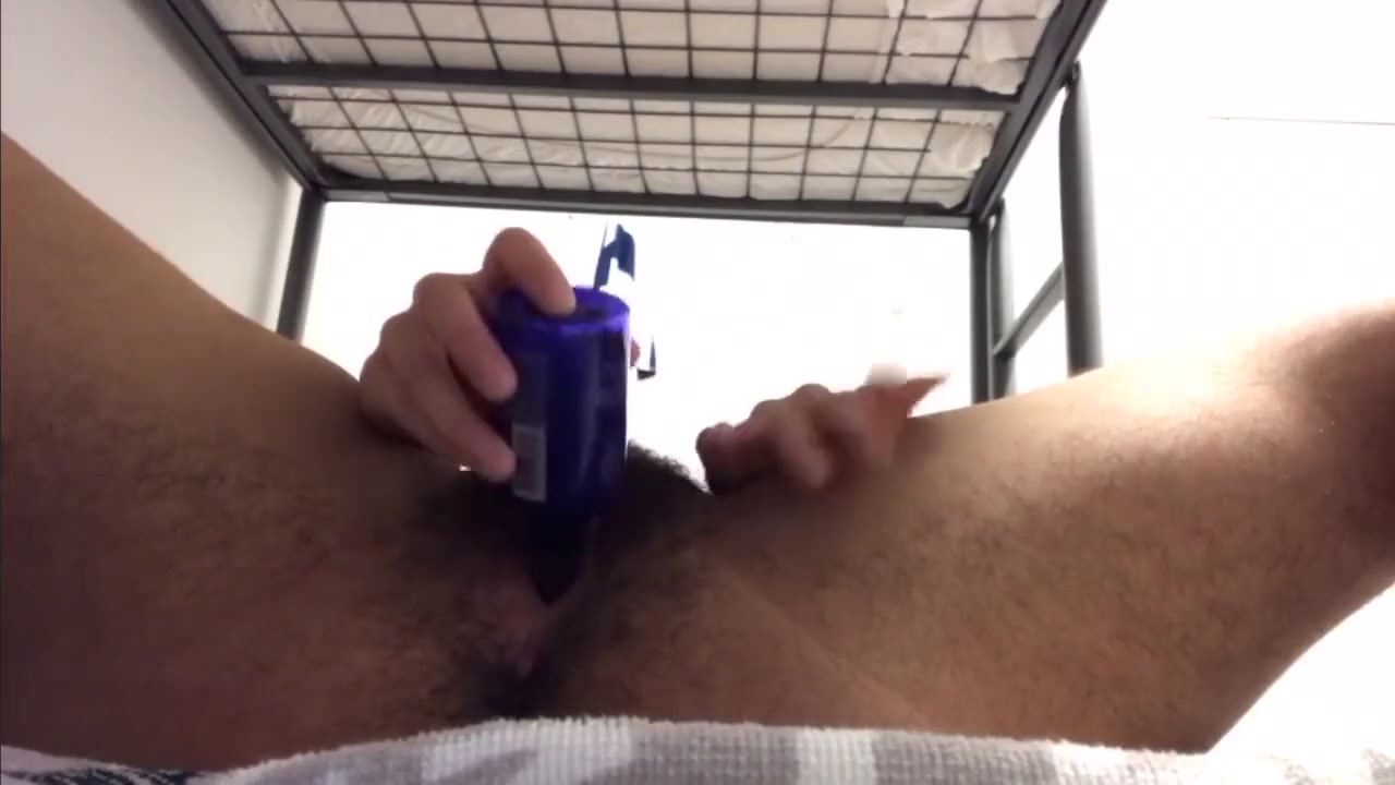 Transboy fails putting rubber band on dick then plays with bottle & squirts