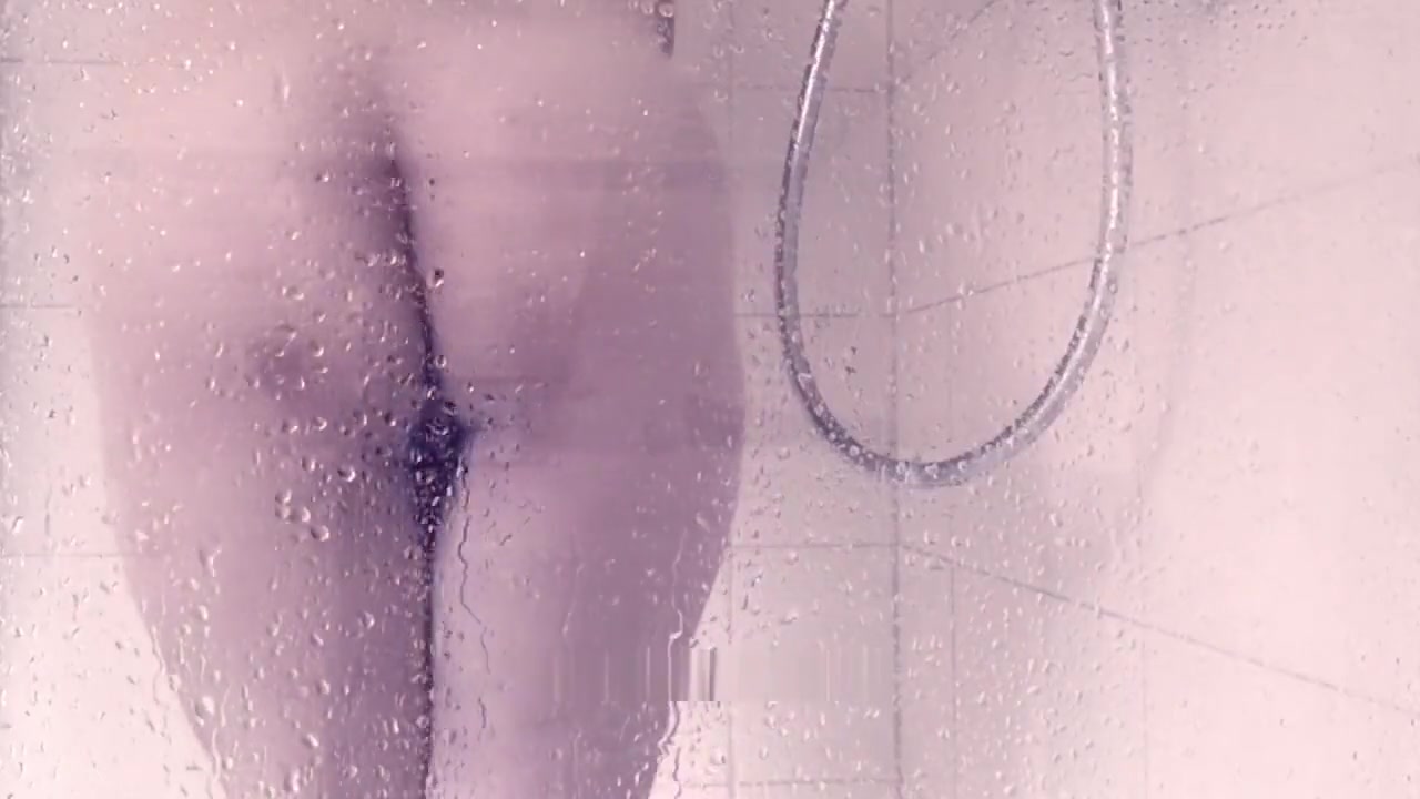 SIssy Tiffani masturbates in the shower