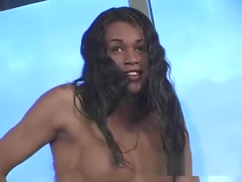 A dark Trans With His penis In His Hand