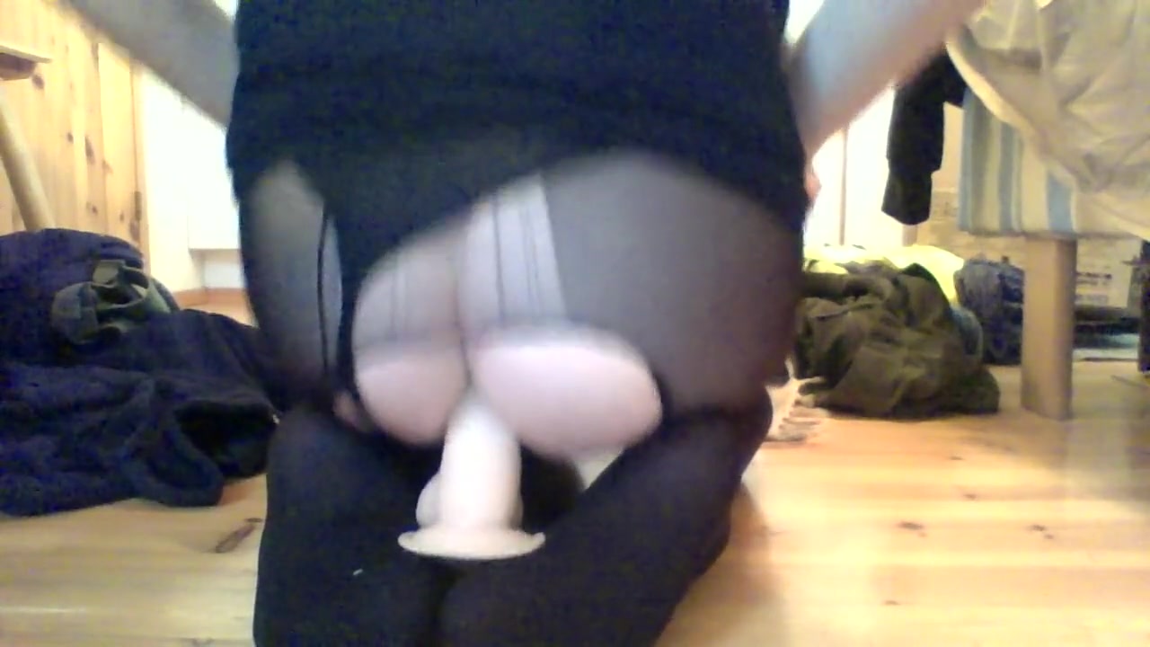 Sissy boy riding a dildo