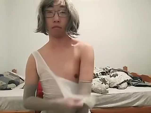 Sissy bitch masturbation in transparent lingerie and long hand gloves