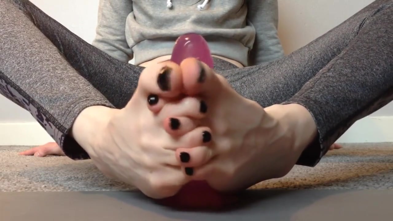 Messy dildo footjob with lube and painted toes.