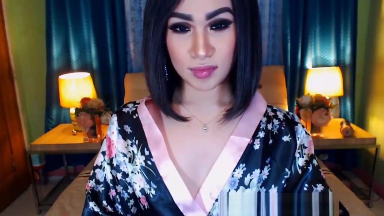 This lovely ladyboy enjoying masturbates wildly