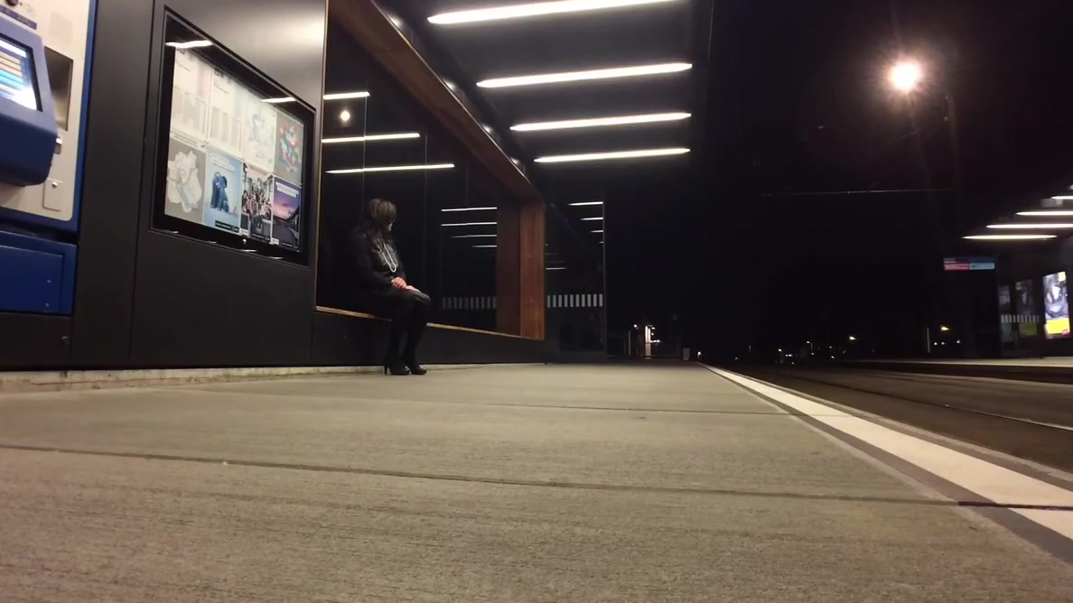 Crossdresser exposing at tram station