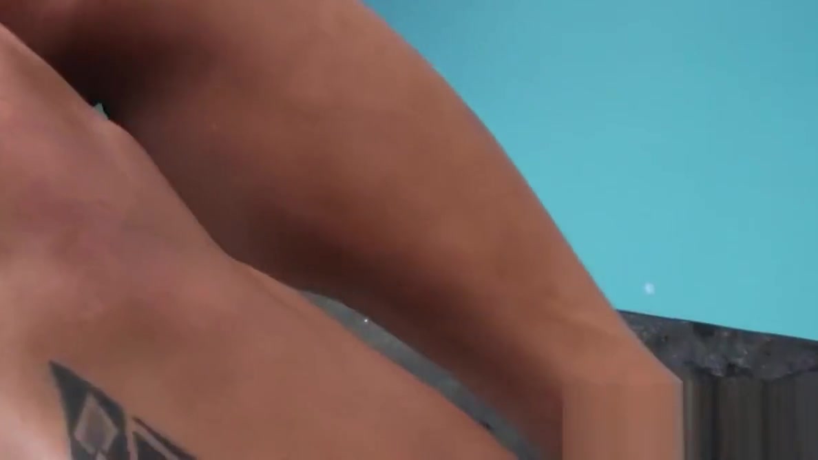 Busty shemale playing with her sexy feet and her huge dick