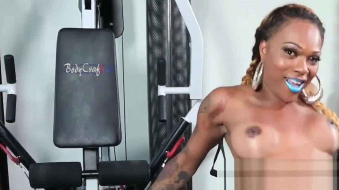 Busty ebony inked tgirl tugging her cock