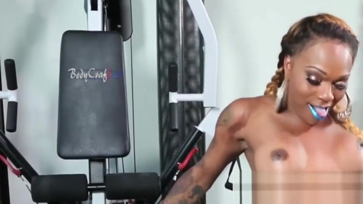 Busty ebony inked tgirl tugging her cock