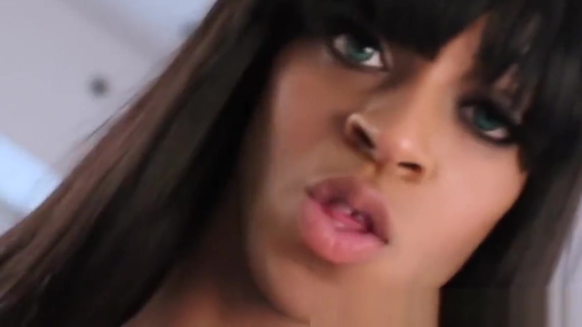 Chocolate tranny Saline Simone drains her massive cock