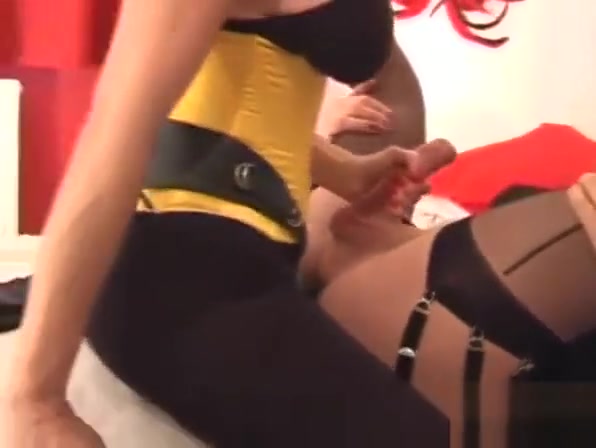 Femdom wanks TGirls big cock as she fucks her tight sexy ass