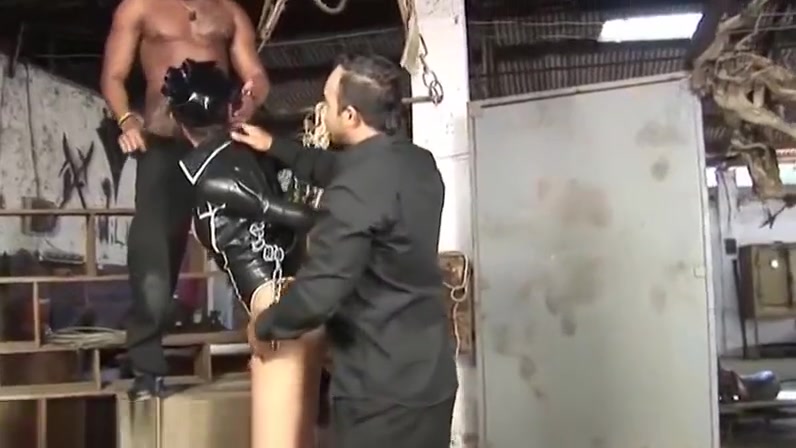 Brunette tranny gets fucked by two studs and takes a big