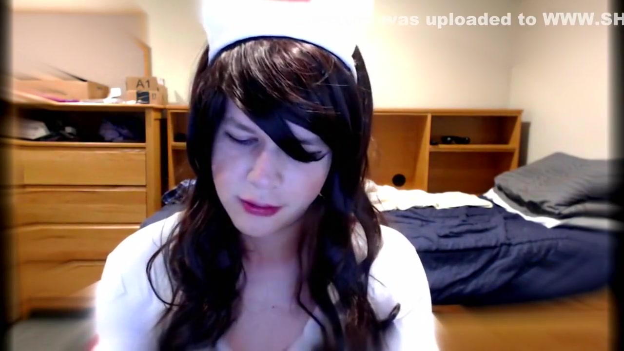 Cute Crossdresser Nurse Blows Dildo