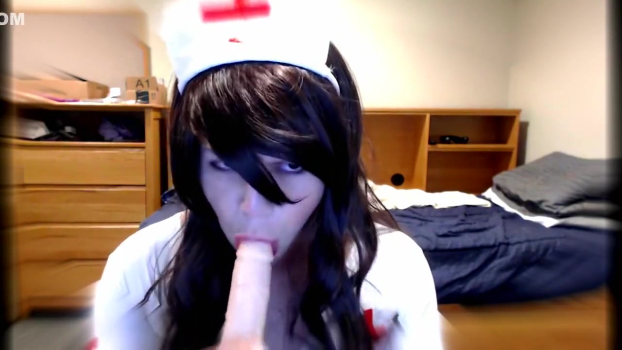 Cute Crossdresser Nurse Blows Dildo