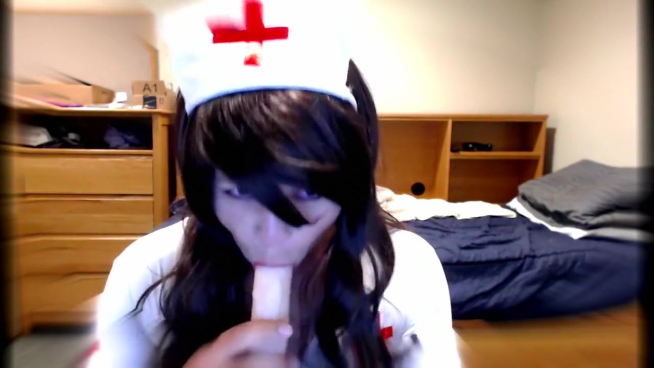 Cute Crossdresser Nurse Blows Dildo