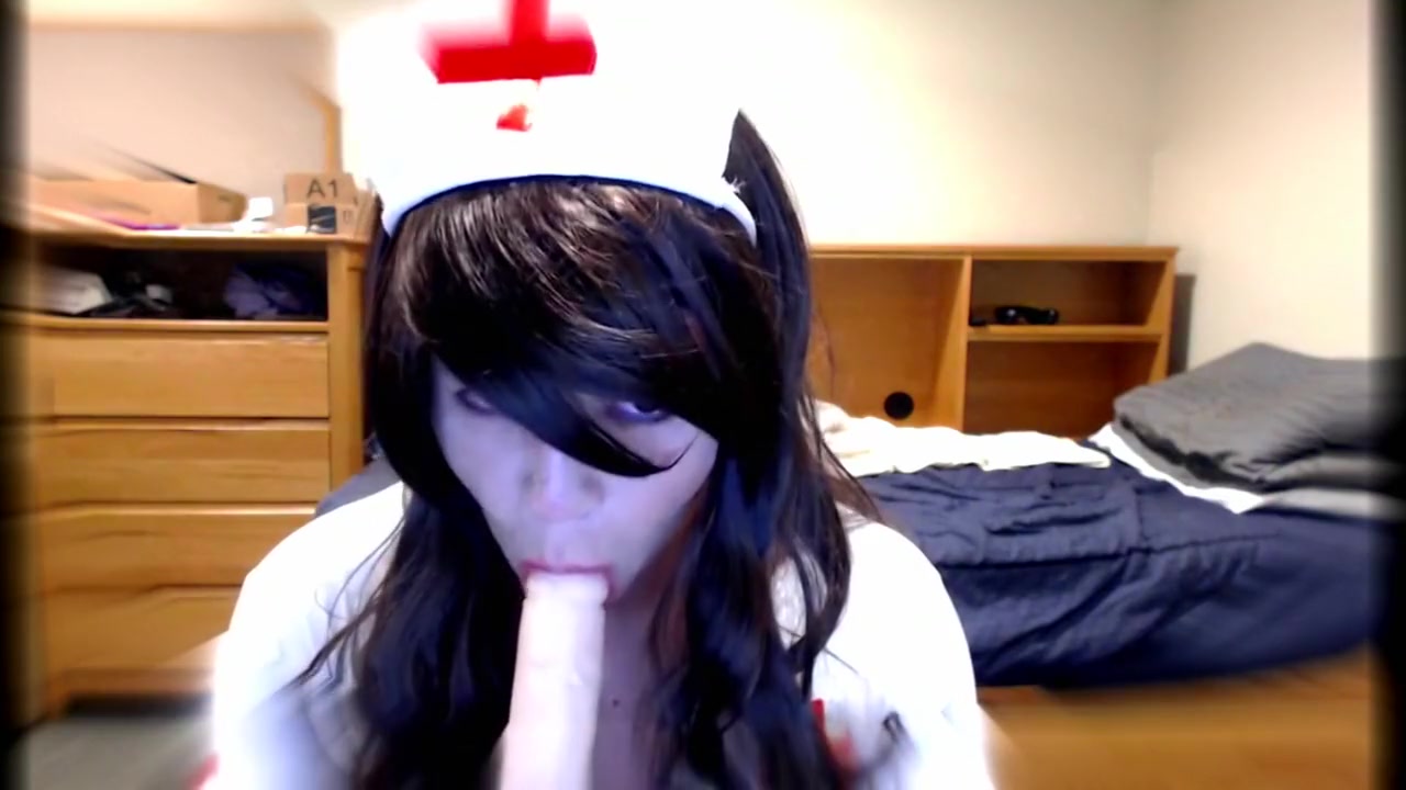 Cute Crossdresser Nurse Blows Dildo