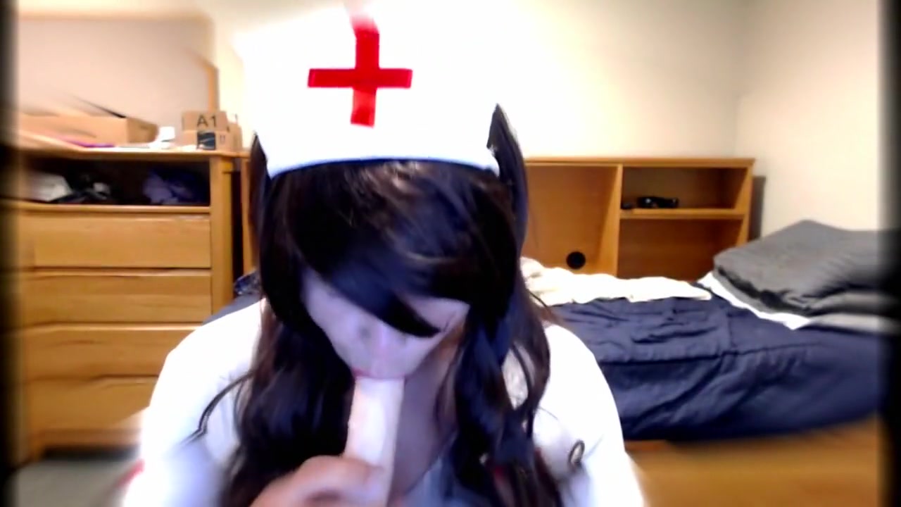 Cute Crossdresser Nurse Blows Dildo