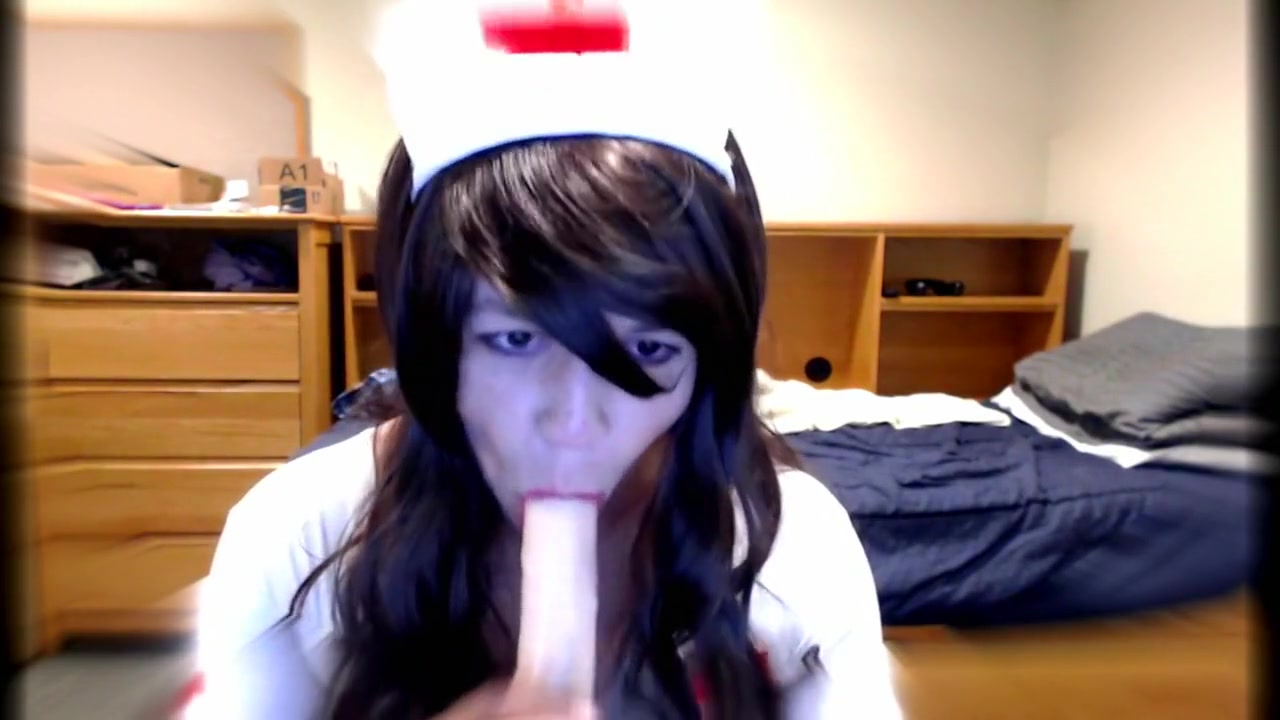 Cute Crossdresser Nurse Blows Dildo