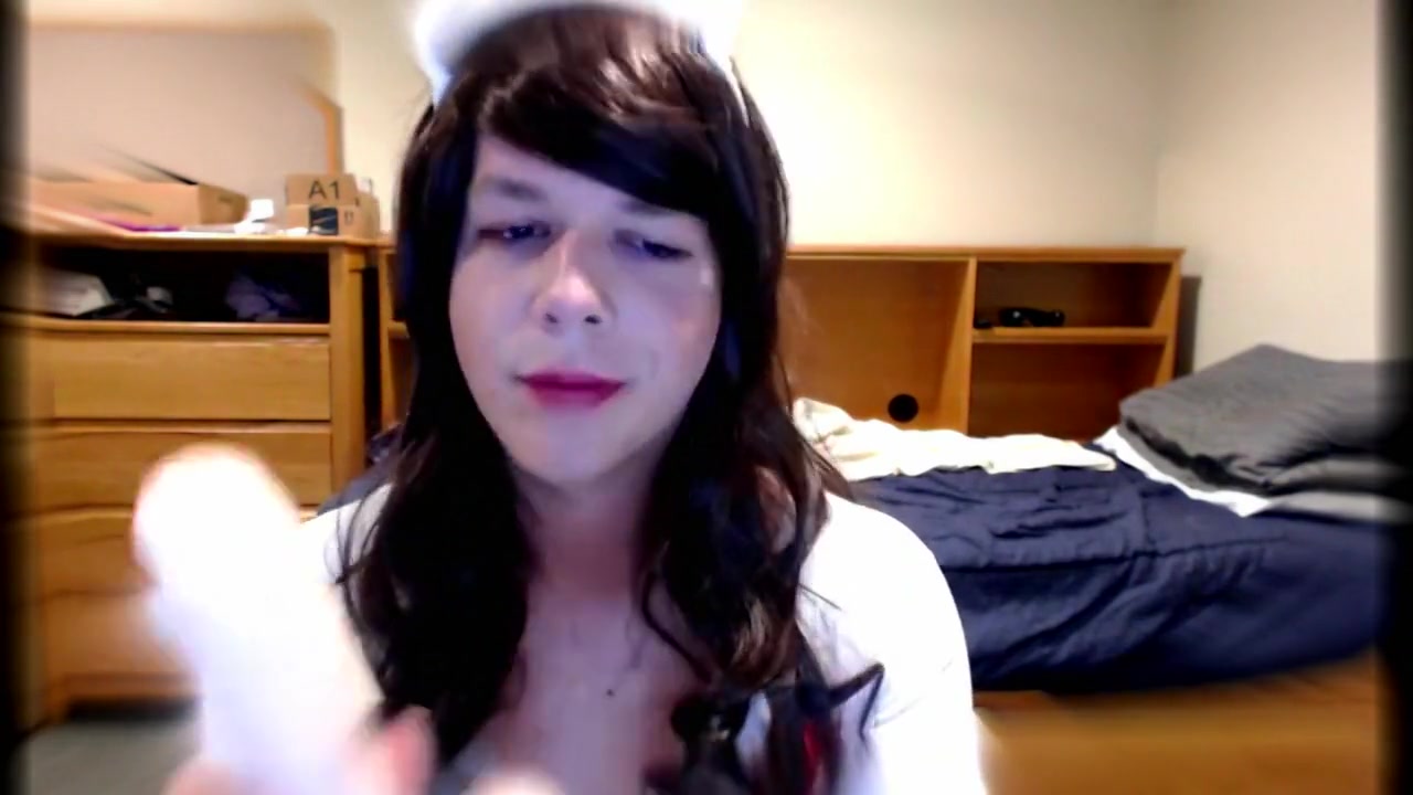 Cute Crossdresser Nurse Blows Dildo