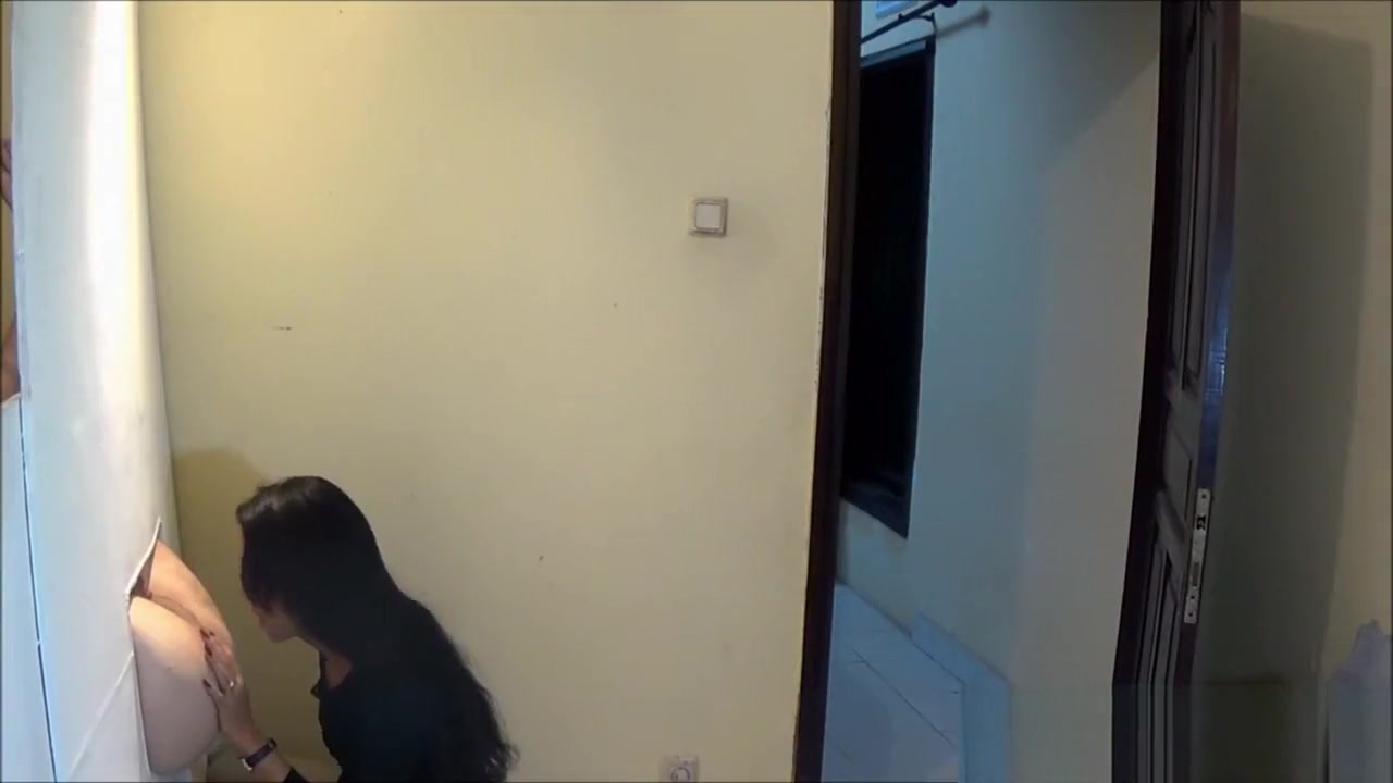 Ladyboy licks and fucks a gloryhole asshole from a guy