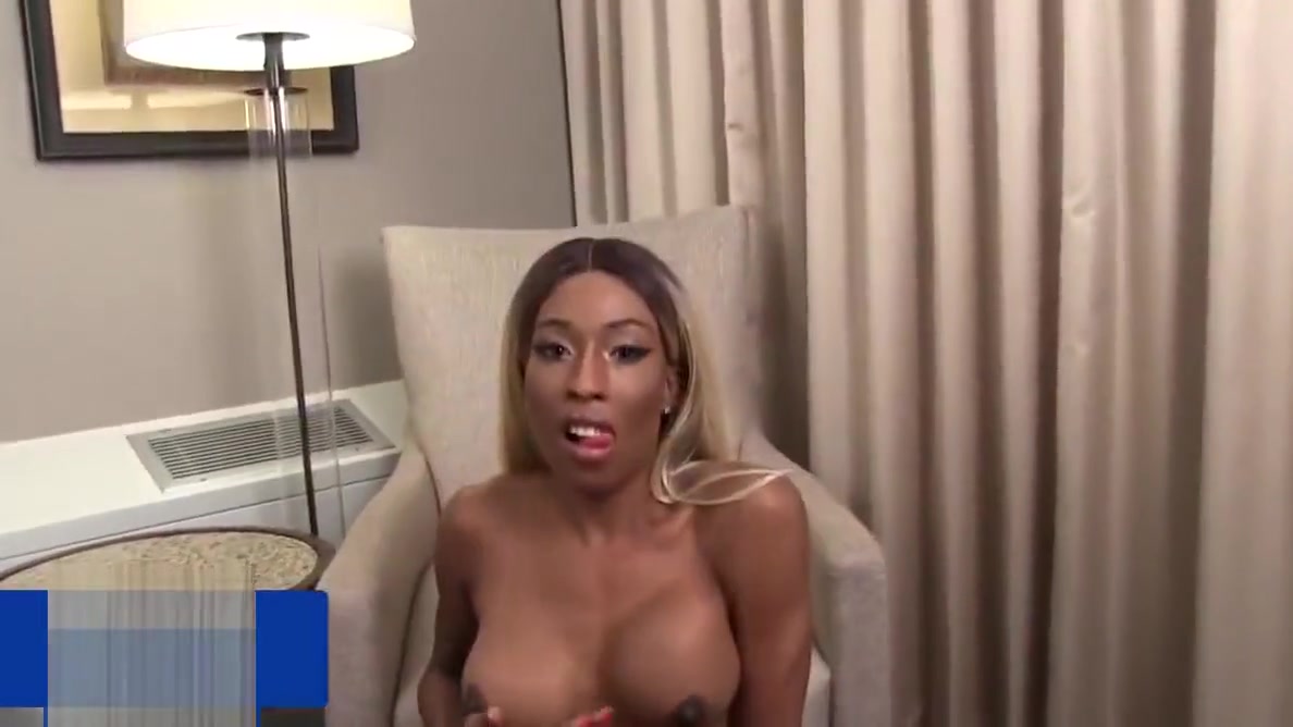 Busty black shemale fingers her ass