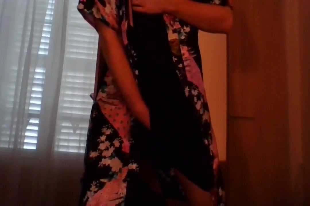 Crossdresser wearing satin robe masturbating and ejaculating all over satin