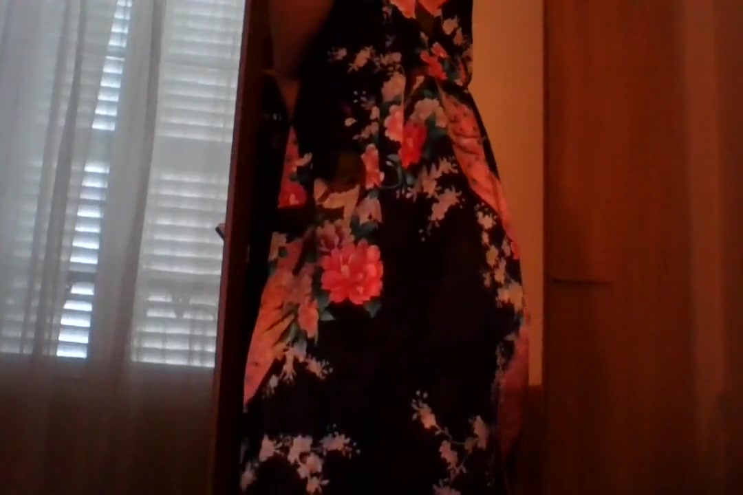 Crossdresser wearing satin robe masturbating and ejaculating all over satin