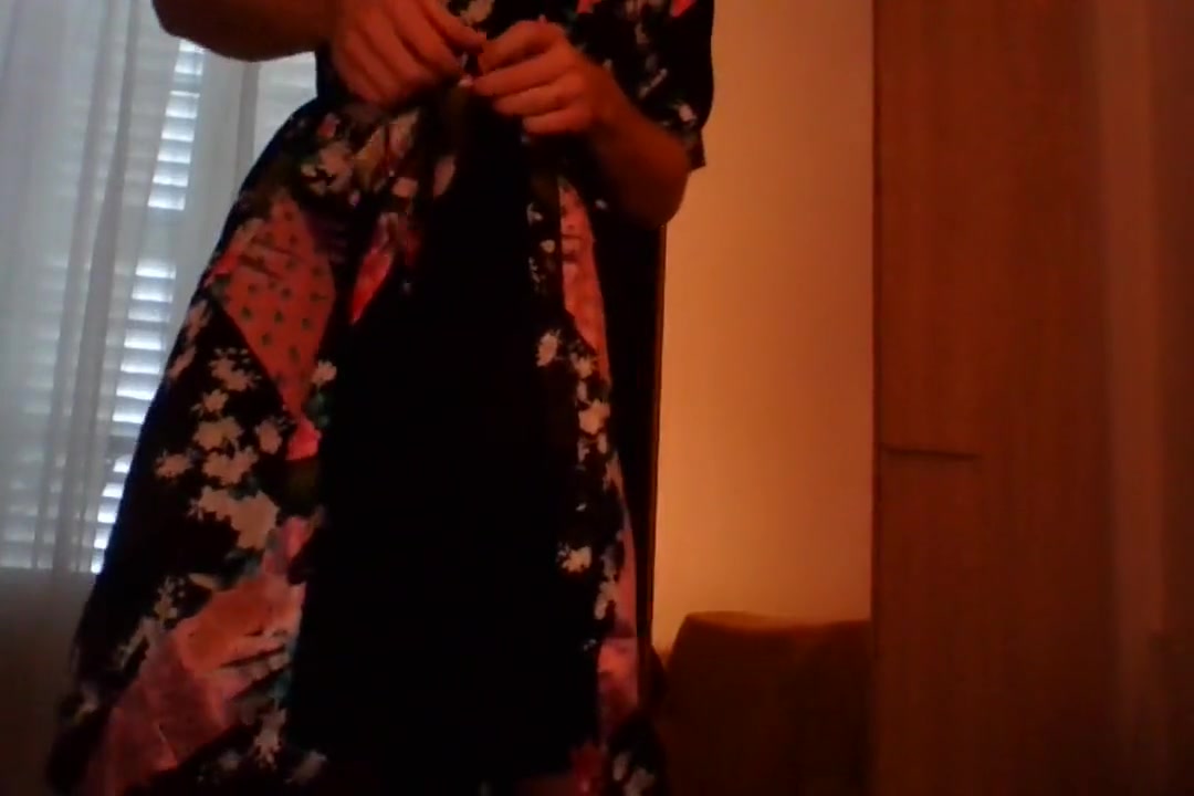 Crossdresser wearing satin robe masturbating and ejaculating all over satin