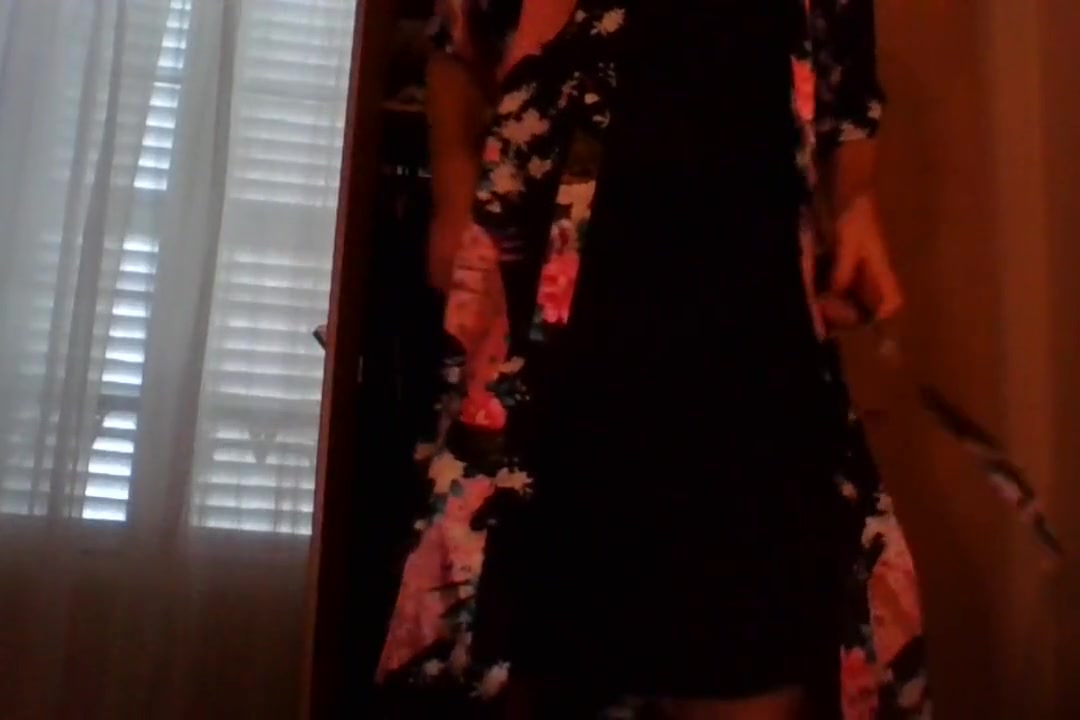 Crossdresser wearing satin robe masturbating and ejaculating all over satin
