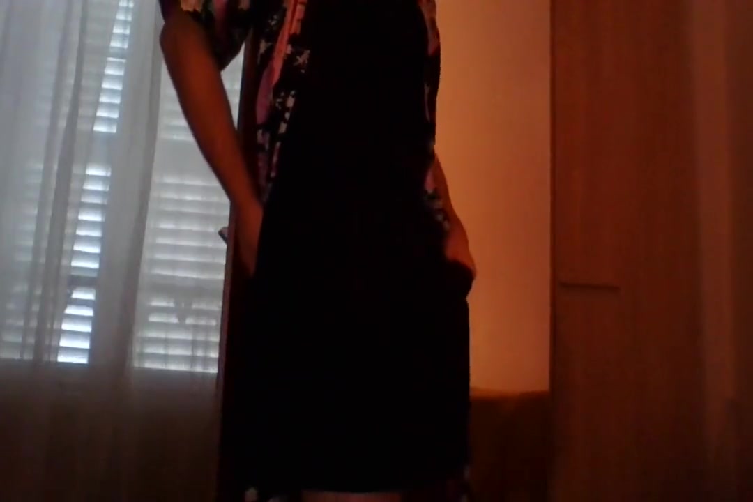 Crossdresser wearing satin robe masturbating and ejaculating all over satin