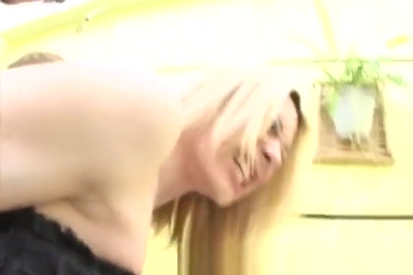 Blonde tranny babe tugging on her cock