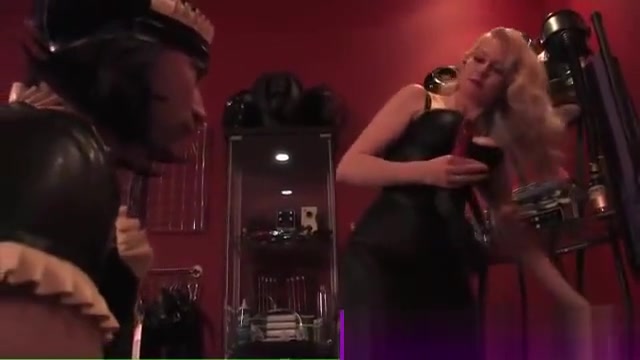 Dominatrix punishing useless husband