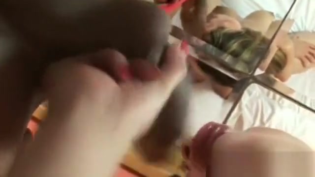 Blonde tranny blows his lover's big cock