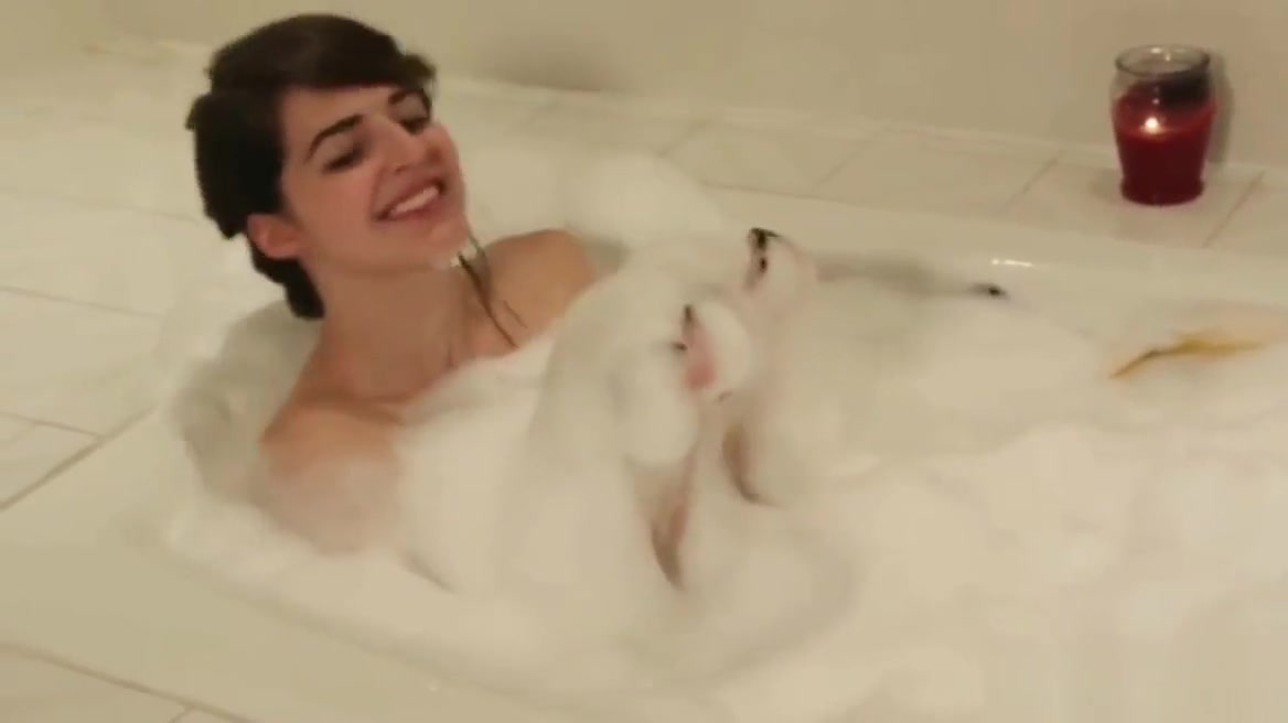 Hot brunette goes solo in the bath