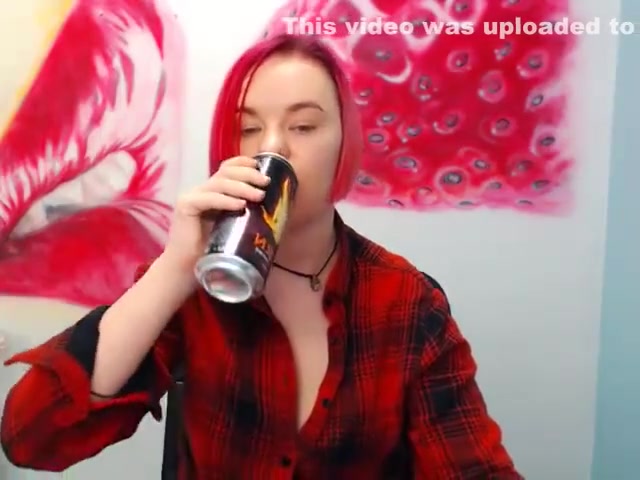 Curvy red head shows off her big tits pt 2
