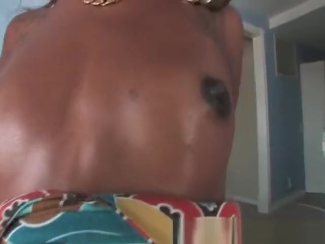 Black shemale Tameka strips and teases