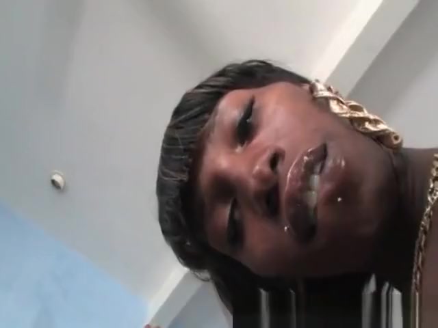 Black shemale Tameka strips and teases