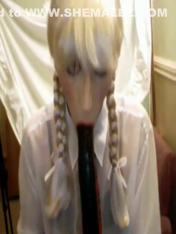 Sissy schoolgurl Crossdresser sucks and fucks dildos