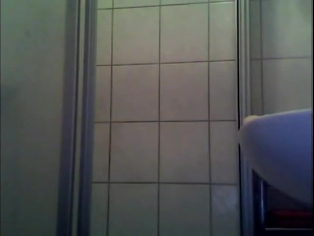 Swarthy tgirl takes a shower