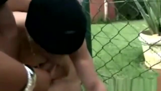 Tranny babes tagteam his butt outdoors