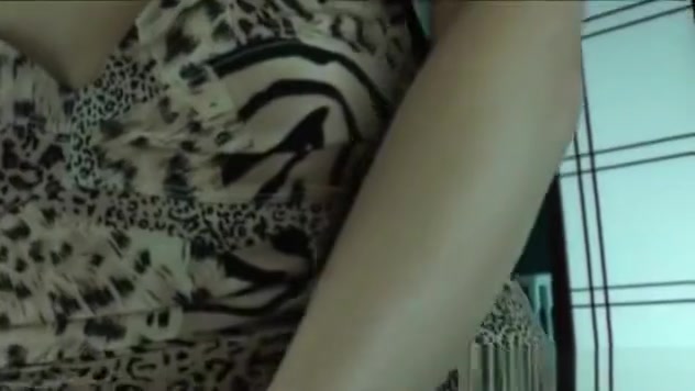 Horny brunette strips fucks herself with dildo