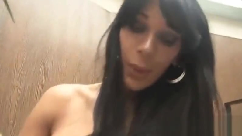 Busty shemale Marcella Italy tugging on her cock