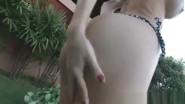Sexy blonde shemale hottie stripping outdoor