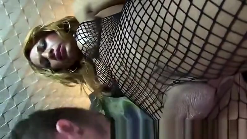 Tranny in fishnet gets her cock sucked off