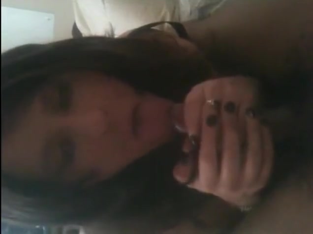 Stylish crossdresser sucks some dick on the cam