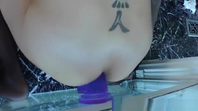 Oriental tranny ladyboy ass rides dildo