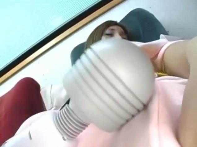 Asian ladyboy plays with vibrator