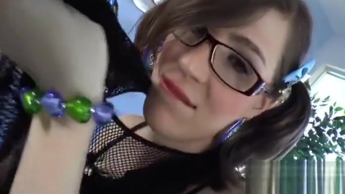 Nerdy brunette shemale with small tits beats off her cock