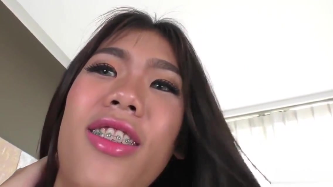 Adorable Asian tranny jerking cock