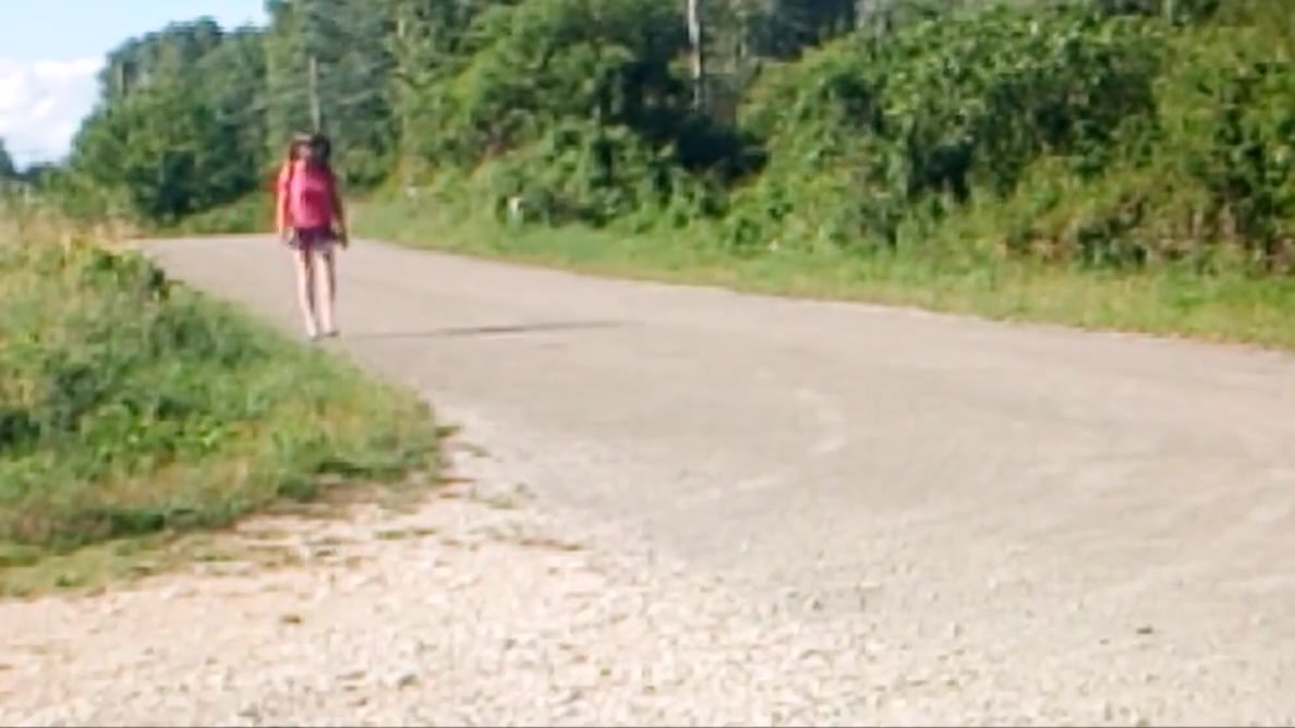 shool girl aurelia waitinb busstop station